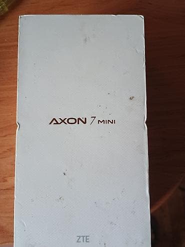 en ucuz plansetler: ZTE Axon 7 Mini, rəng - Qızılı, Barmaq izi — 2
