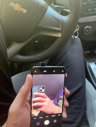 rəsmi niye 10: Xiaomi Mi 9T, rəng - Qara, 
 İki sim kartlı — 3