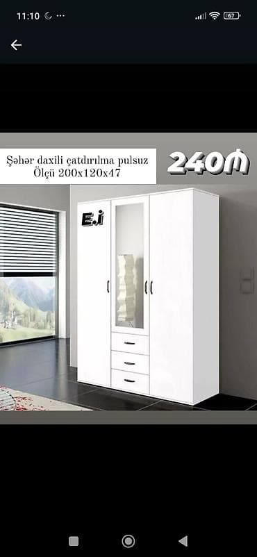 Ağ rəngli 3 qapılı paltar dolabı. Orta hissədə şüşəli qapı və altında