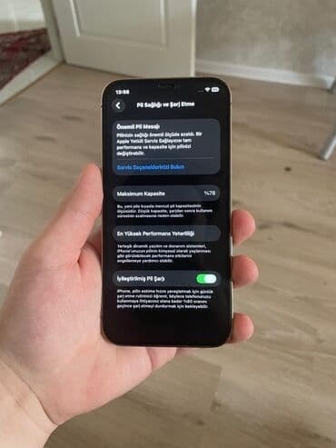 nar suyu sixan: IPhone 12 Pro, Qızılı, Face ID — 7