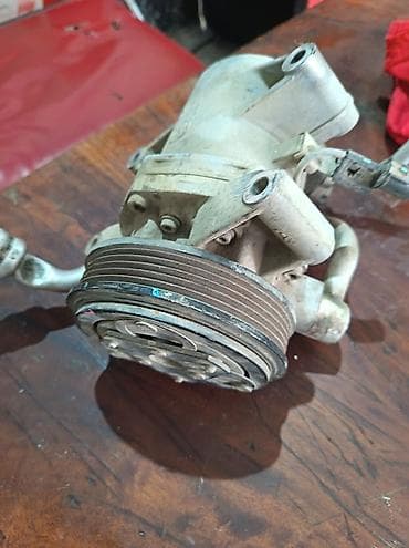 elektron teker nasosu: Mitsubishi l200 kampressoru kondisenir temiri — 3