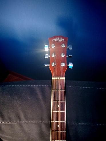 Гитары: Elektro-akustik gitara – cutaway korpuslu, sunburst rəng keçişli model — 5