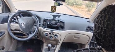 hundai disk: Hyundai Accent: 1.4 l | Sedan — 6