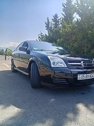volkswagen passat 1: Opel Vectra sedan – qara rəng, şəhər və tras üçün komfortlu və geniş — 2