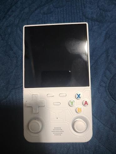 Daşınan retro oyun konsolu Xüsusiyyətlər: - Kompakt, əl boyda korpus