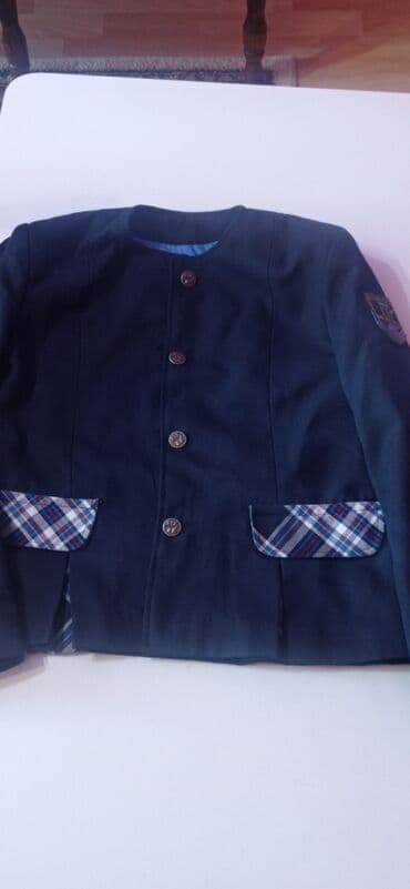 Donlar: Məktəbli pencəyi təzə iki dəfə geyilib. O birisi pencəklərdən seçilir — 2