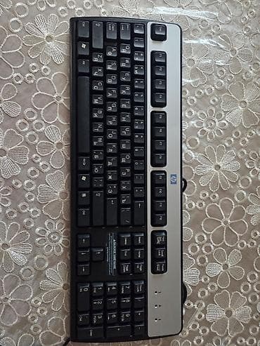 HP Silver/Black Multimedia PS/2 Keyboard (Model: KU-0316 / KB-0316)