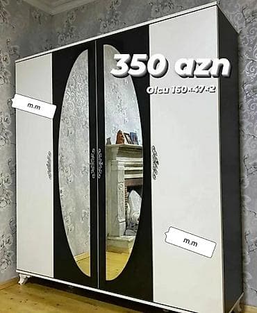 Ağ və qara rənglərin birləşməsindən ibarət olan bu qarderob, iki