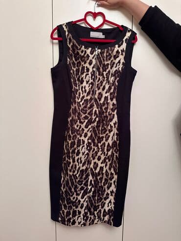 Karen Millen paltar 
Cox az geyinilib
42 Razmer