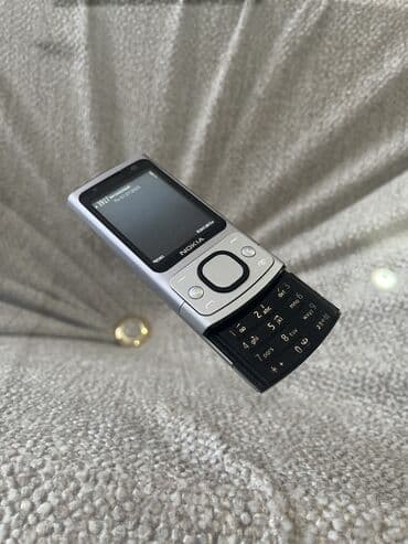 телефон 6700 nokia: Nokia 6700 Slide, rəng - Gümüşü, Zəmanət — 3