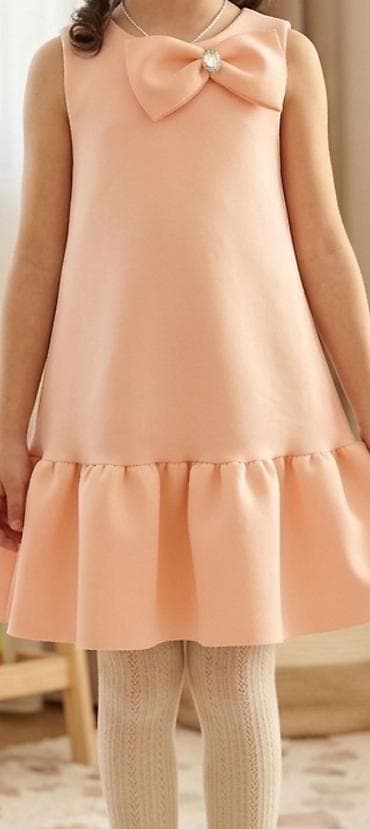 Uşaq paltarı yaş 9,10,11– şaftalı rəngdə, A-kəsimli, yüngül və