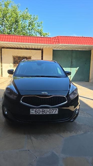 mini cps: Kia Carens (qara rəng), ili 2016, 7 yerlik rahat ailə miniveni — 2