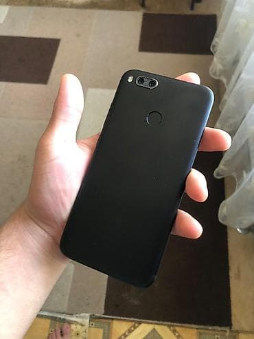 iphone 15 pro max 256gb: Xiaomi Mi A1, 64 GB, rəng - Qara, 
 Sensor, Barmaq izi, İki sim kartlı — 4