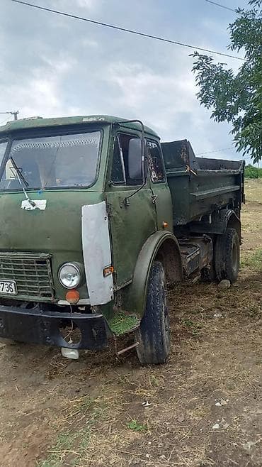 satisda olan traktorlar: MAZ dumper yük maşını - Marka/model: MAZ (ön paneldə MAZ emblemi) - — 6