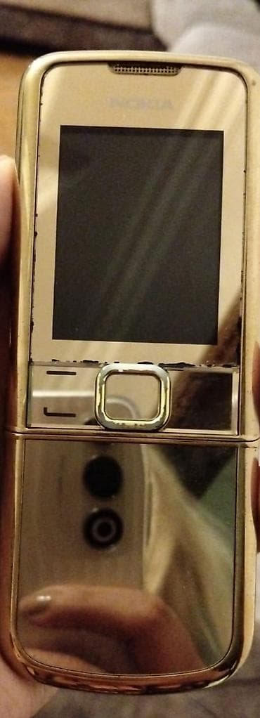 Nokia < 2 GB Memory Capacity, rəng - Qızılı, Düyməli, İki sim kartlı