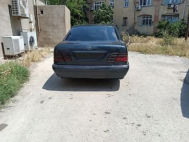 te 150 traktor: Mercedes-Benz E 230: 2.3 l | 1997 il Sedan — 5