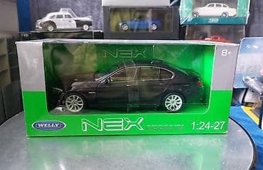 f90 bmw: Коллекционная модель BMW 535i f10 black metallic 2010 welly art — 4