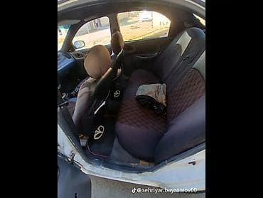 06 sekileri: Daewoo Lanos: 1.5 l | 1997 il Sedan — 4