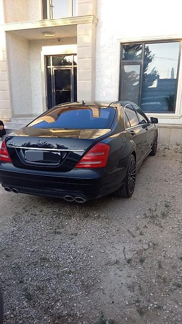 mercedes benz cl class: Mercedes‑Benz S-Class sedan (W221), qara rəng, V12 emblemli. Xarici — 5