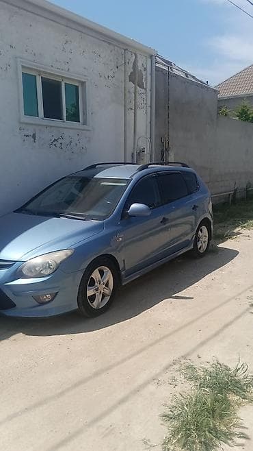 kia optima 2 sade mator: Hyundai i30 CW (universal) – mavi rəngli, Blue Drive nişanlı — 3