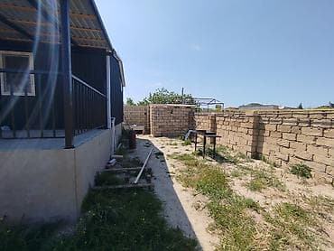 hezide kiraye ev: Goradil baglarinda köhnə hamama yaxın asvaltli küçə dənizə yola yaxin — 3