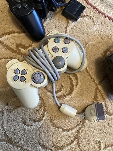 plesdeyşin 2: Sony PlayStation 2 Slim (PS2) oyun konsolu Xüsusiyyətlər: - Model — 3