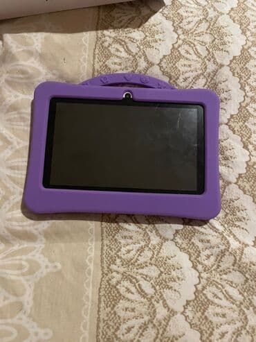 uşaqlar üçün planşetlər: Uşaqlar üçün nəzərdə tutulmuş NodiZZ Npad702 planşet. Ağ rəngli — 4