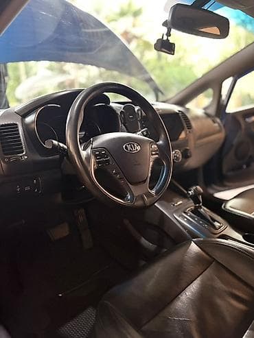 Kia Cerato: 2 l | 2013 il Sedan — 10