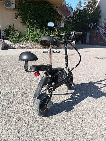 e39 guzgu: Elektrikli skuter. 10 Ah. Tam doldurma ilə 20-25 km. Sürət təxminən 20 — 2