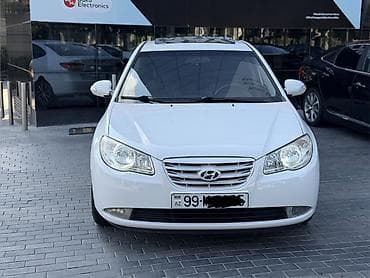 07 peredok: Hyundai Elantra: 2 l | 2009 il Sedan — 2