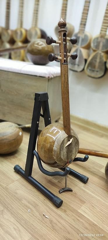 elektron gitara yolana: Kamança Rast musiqi alətləri Mağazasınin unvanlari; 1) Əhmədli Neapol — 1