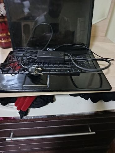 Masaüstü kompüterlər və iş stansiyaları: Casper noutbuk - Korpus: qara, parlaq üst qapaq. Alt hissədə — 4