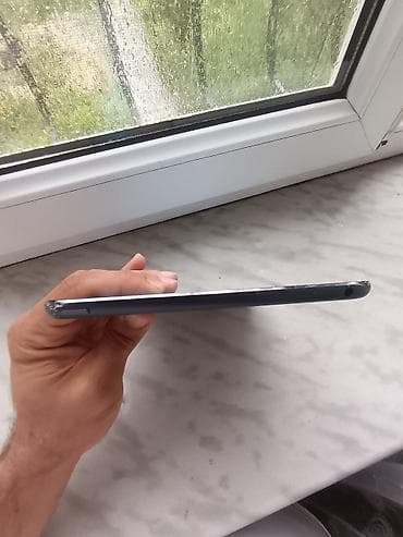 20 s: Apple iPad mini (1-ci nəsil) - 7.9 düym Retina displey, iOS interfeys — 6