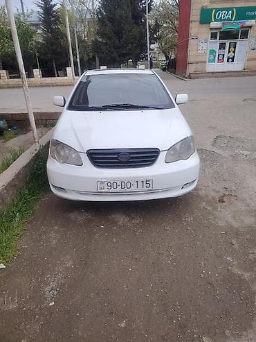 radiator masin: BYD F3 sedan – ağ rəngli, 4 qapı, ön-arkalı tam ölçülü salon. Xarici — 1