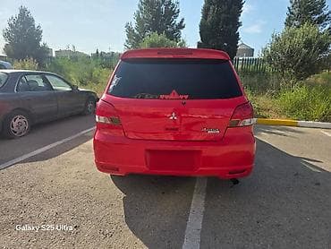 passat disk: Mitsubishi Airtrek: 0.2 l | 2002 il 285300 km Universal — 2
