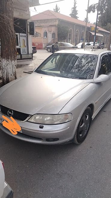 Opel Vectra B sedan - Kuzov: sedan, gümüşü rəng - Mühərrik: benzin
