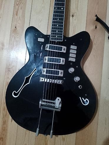 İdman və hobbi: Salam Elektro gitara satilir problem fln yoxdur islekdir toy — 2