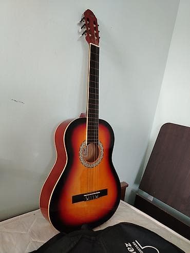 gitara klasik: Salam, gitara çox yaxşı vəziyyətdədir, heç bir problemi yoxdu təzə — 1