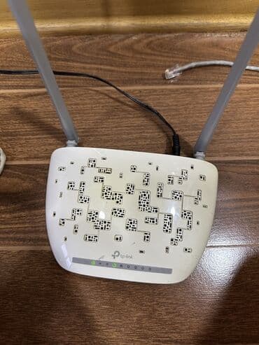 modem fiber optik: TP-Link simsiz marşrutlaşdırıcı, evdə və ya kiçik ofisdə internet — 1