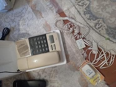 Stasionar telefon Simli