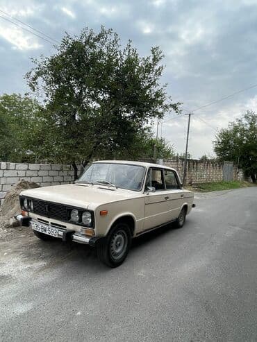 ваза напольная стеклянная высокая без узора: Model: VAZ 2106 sedan Xüsusiyyətlər: - Rəng: ağ, 4 qapı - Mexaniki — 6