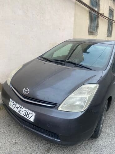 Toyota Prius Hybrid – 5 qapılı liftbek, tünd boz rəng. - Hibrid