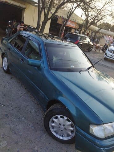бампер на мерседес w210: Mercedes-Benz markalı, tünd firuzəyi rəngli sedan. Avtomobil rahat və — 5