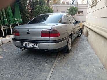 06 sekileri: Opel Omega: 2 l | 1994 il 200000 km Sedan — 7
