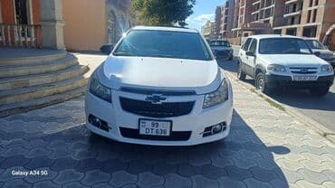 qapi zili: Chevrolet Cruze LT sedan - Kuzov: ağ rəng, 4 qapı, arxa spoylerli - — 1