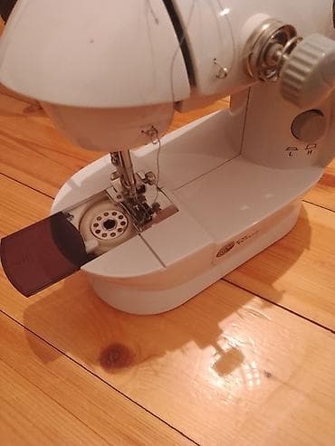TİKİŞ MASİNİ İSLENMEYİB TOKLA VƏ YAXUD ELLE İSLEYİR VE AYAĞ PEDALİ
