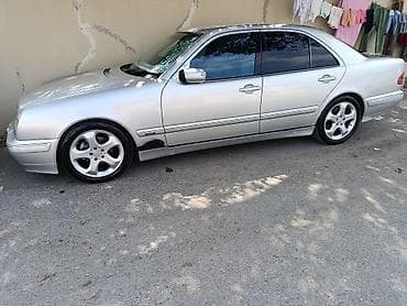 w210 teker: Mercedes-Benz E-Class (W210) sedan – orijinal AMG üslublu 5 çıxışlı — 4
