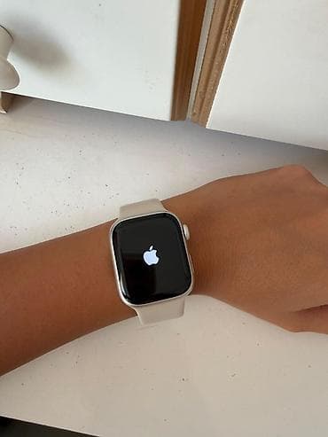 Apple Watch (Alüminium gövdə, Light/Bej rəngli silikon kəmər) Xanıma