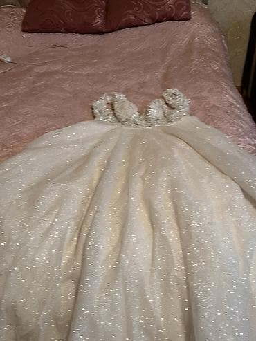 efsane inci: Gəlinlik – zərif parıltılı A-kəsim - Rəng: süd ağ/ivori tonlarında - — 2