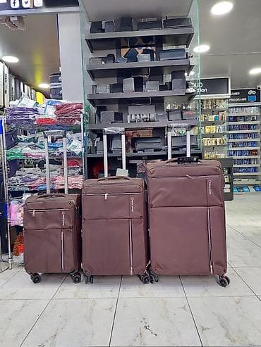 Çamadanlar: Səyahət çamadan dəsti – 3 ölçü, təkərlərlə - Rəng: tünd qəhvəyi - — 1